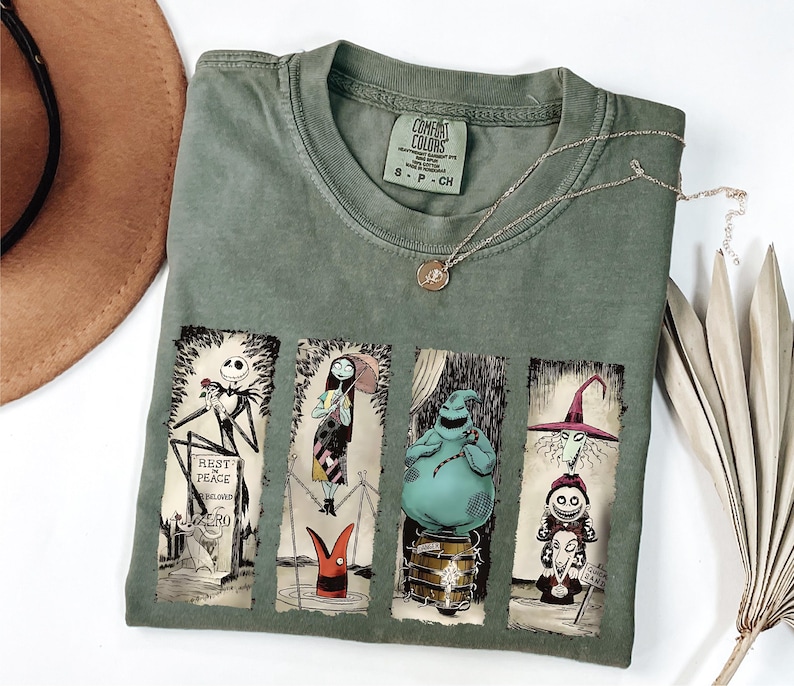 a t - shirt with a picture of monsters on it