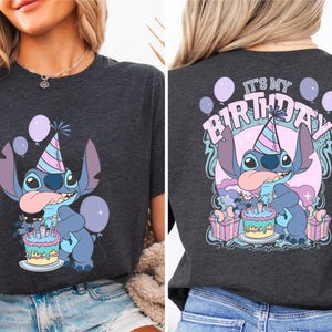 a woman wearing a t - shirt that says it's my birthday