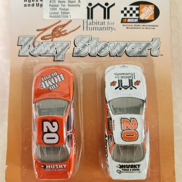 Vintage 1999 Action Racing Collectables Limited Edition Tony Stewart Home Depot and Habitat for Humanity Racecar set.