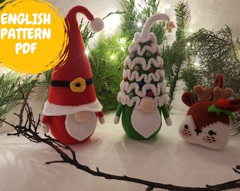 May include: Three crocheted Christmas ornaments: a red and white gnome with a white beard, a green gnome with a white tree hat, and a brown reindeer with a green holly sprig.