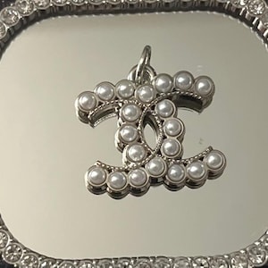Only One- ELEGANT- Chanel silver  zipper pull charm/pendant.