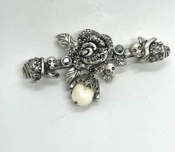 Alexander mcqueen brooch hotsell