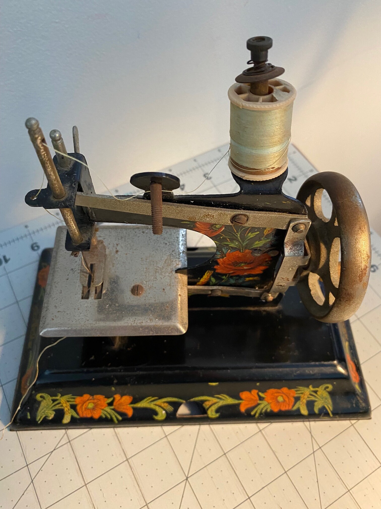 Vintage Casige Toy Sewing Machine, Black With Roses German Toy Sewing