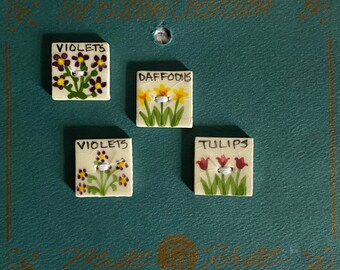 Flower themed handcrafted ceramic buttons includes two violets, one daffodil and one tulip