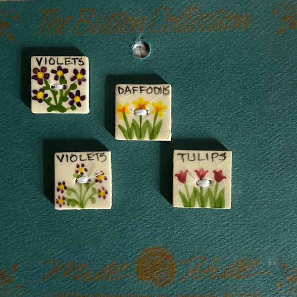 Flower themed handcrafted ceramic buttons includes two violets, one daffodil and one tulip