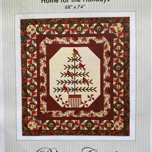 May include: Quilt pattern for a "Home for the Holidays" quilt featuring a red and green Christmas tree with red cardinals and a red, white, and green border. The pattern is 68 inches by 74 inches and is from Bloom Creek.
