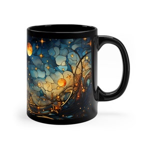 May include: Black ceramic mug with a stained glass design featuring a blue and gold starry night sky with two orange moons.