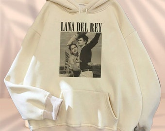 Sweat à capuche Lana Del Rey Ultraviolence : plongez dans la fusion de la musique et de l'esthétique avec le style du sweat à capuche de l'époque Norman Rockwell