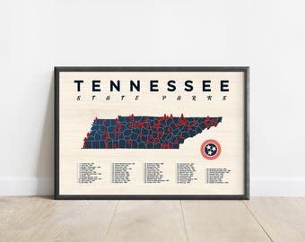 May include: A framed print titled TENNESSEE STATE PARKS featuring a dark blue map of Tennessee on a light wood grain background. The map displays numerous red location markers and a circular Tennessee state emblem. A numbered list of parks is below.