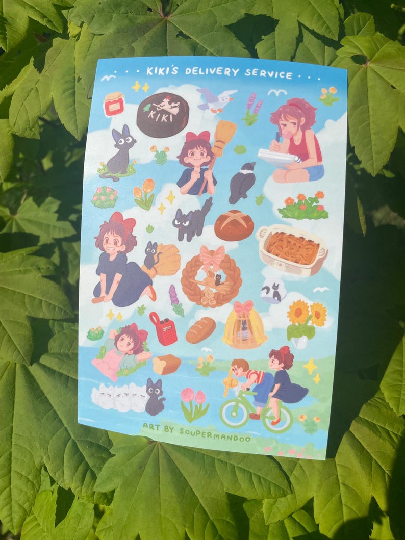 May include: A sticker sheet featuring illustrations from "Kiki's Delivery Service." The sheet includes images of Kiki, Jiji the cat, baked goods, and other elements from the film. The text "Kiki's Delivery Service" is at the top.
