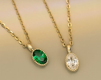 Vintage Glamour: 14K Gold Oval Diamond and Emerald Pendant Necklace