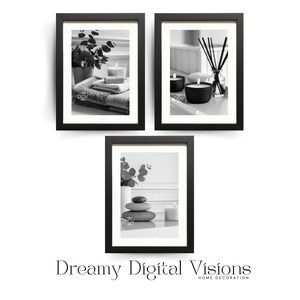 A set of 3 relaxing spa bathroom prints. Featuring minimalist black and white photography, each print showcases a calming scene with candles, towels, and soothing natural elements, displayed on the wall over a bathtub in a modern bathroom setting