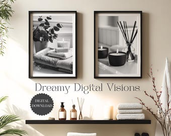 May include: Black and white framed prints of bathroom decor. One print shows a candle, soap, and towels. The other shows candles and a reed diffuser. The prints are above a shelf with bottles and a diffuser.