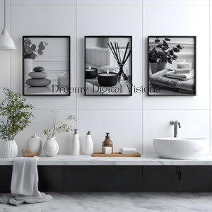 A set of 3 relaxing spa bathroom prints. Featuring minimalist black and white photography, each print showcases a calming scene with candles, towels, and soothing natural elements, displayed on the wall in a calming spa room setting