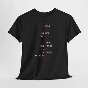 May include: Black t-shirt with white and red text. The text includes the words "CFOP", "rubik's cube", "Speed algorithm", "F2L", "average", "scramble", and "PR". The shirt is a casual wear item.