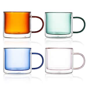 May include: Set of four double-walled glass mugs with colored glass interiors. The mugs are orange, green, blue, and pink.