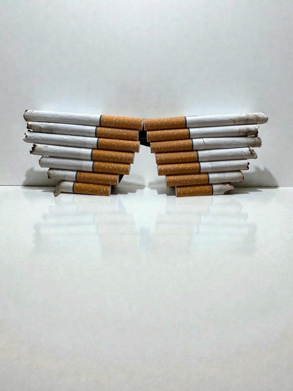 telephone cigarette glasses Cigarette Sunglasses. Lady Gaga Telephone-inspired Shades!