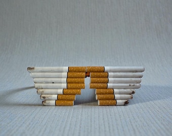 why are cigarettes getting more expensive The cigarette will be more expensive. The new budget puts a 16% tax on  cigarettes, so the cigarette that cost me ₹15 will now cost approximately  ₹20. But wait! Will that have