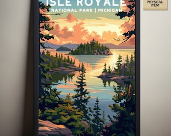 May include: Framed art print featuring a scenic view of Isle Royale National Park in Michigan. The artwork depicts a lake scene with islands, trees, and a colorful sunset. The text "ISLE ROYALE NATIONAL PARK | MICHIGAN" is displayed at the top.
