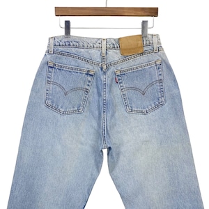 90s Vintage Levi&#39;s 560 Jeans: Light Wash High Waisted Denim (W31 L30.5)