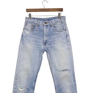 90s Vintage Levi&#39;s 505 Jeans: Light Wash Distressed Denim, Size 31