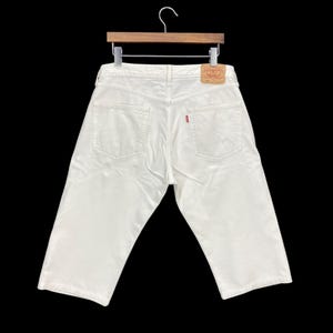 Levi&#39;s 501 Jeans Size Waist 34 90&#39;s Vintage Y2K Levis 501 Button Fly Short Cut Off Jeans Light Wash Distressed Jeans W34 L17