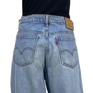 Levi's Jeans Size Waist 32 90s Vintage Light Wash Tapered Denim