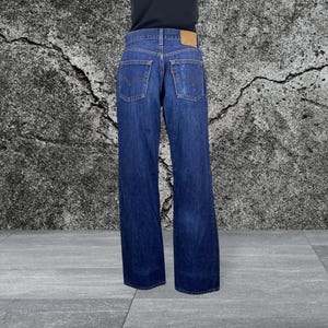 Vintage Levi&#39;s 560 Jeans: Distressed High Waisted Denim, Size 27