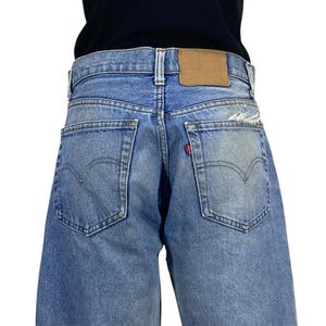 Levi&#39;s 505 Jeans Size 31 80s Vintage Levis Jeans 505-0217 Tapered Leg Light Wash Distressed Denim W31 L28