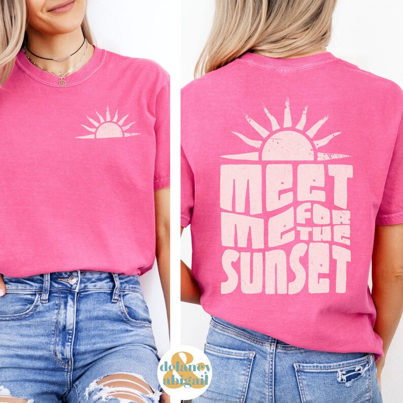 May include: Pink t-shirt with a white sun graphic on the front and the text "Meet me for the sunset" on the back.