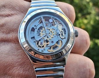 Luxury Rare Automatic Swatch Skeleton YAS100G Watch please note:The clock says 01.
