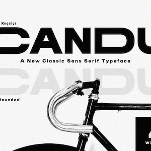 May include: A black and white image of the word "CANDU" in a bold, sans-serif font. The word is shown twice, once in a regular style and once in a rounded style. The text "A New Classic Sans Serif Typeface" is below the word "CANDU". Below the rounded word "CANDU" is the text "Rounded". A black bicycle handlebar is in the center of the image. The text "4 WEIGHT" is in the bottom right corner of the image.