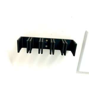Hockey Stick Holder / Holds 5 Junior SIZE Sticks / Hockey Stick Wall Holder/ Organize hockey gear/ Wall-mountable Hockey Stick Rack
