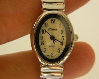 Vintage Xanadu Quartz Wristwatch – Japanese Movement Silver Tone Cuff Bracelet