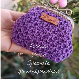 Click-clack coin purse, Click-clack wallet.