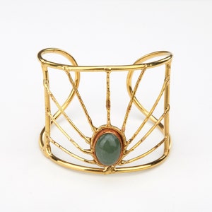 Oval green jade on wide brass wire cuff, Very wide brass frame cuff radiating rays pattern, green jade statement cuff