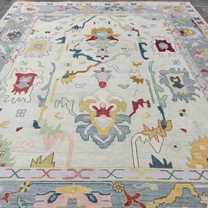 Hand Knotted Oushak Rug: Bright Colors, New Zealand Wool