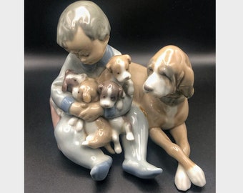 Lladro 5456 New Playmates - Boy and Puppies Figurine
