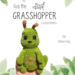 May include: A crochet pattern for a green grasshopper amigurumi toy named Gus. The pattern is available as a PDF download only. The image shows a completed Gus the Grasshopper amigurumi toy.