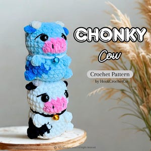 May include: Two stacked, handmade crochet cows. The top cow is light blue with a pink nose and black eyes. The bottom cow is white with black spots and a pink nose. The text "CHONKY Cow" and "Crochet Pattern" are visible.
