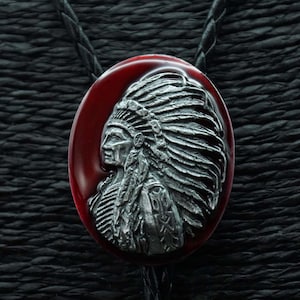 Bolo tie - leather neck strap Indian head on red shield