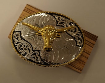 Belt buckle gold bull skull on silver with black decorative shield