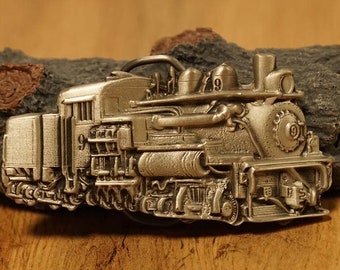 Belt buckle of the steam train in nickel