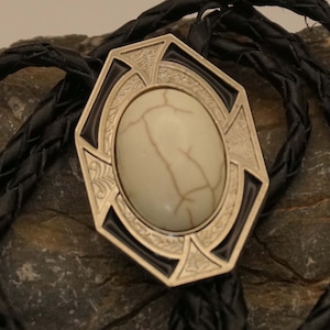 Western bolo tie - lace tie white stone in rectangular decorative shield black with silver