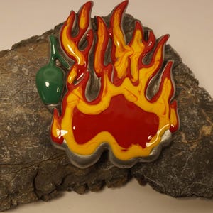 Belt buckle flames