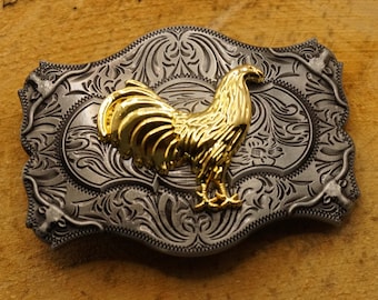 Belt buckle rooster on ornate shield