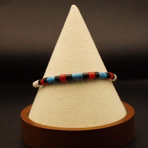 Indian beaded bracelet in black, blue, red and white image 2