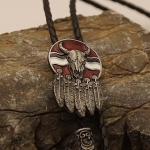 Bolo tie bull skull with shield with feathers