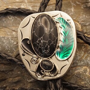 Western bolo tie - lace-up tie black stones with leaf on nickel-colored shield