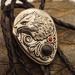 Bolo tie - leather lace-up tie with an eagle and a black stone on a shield